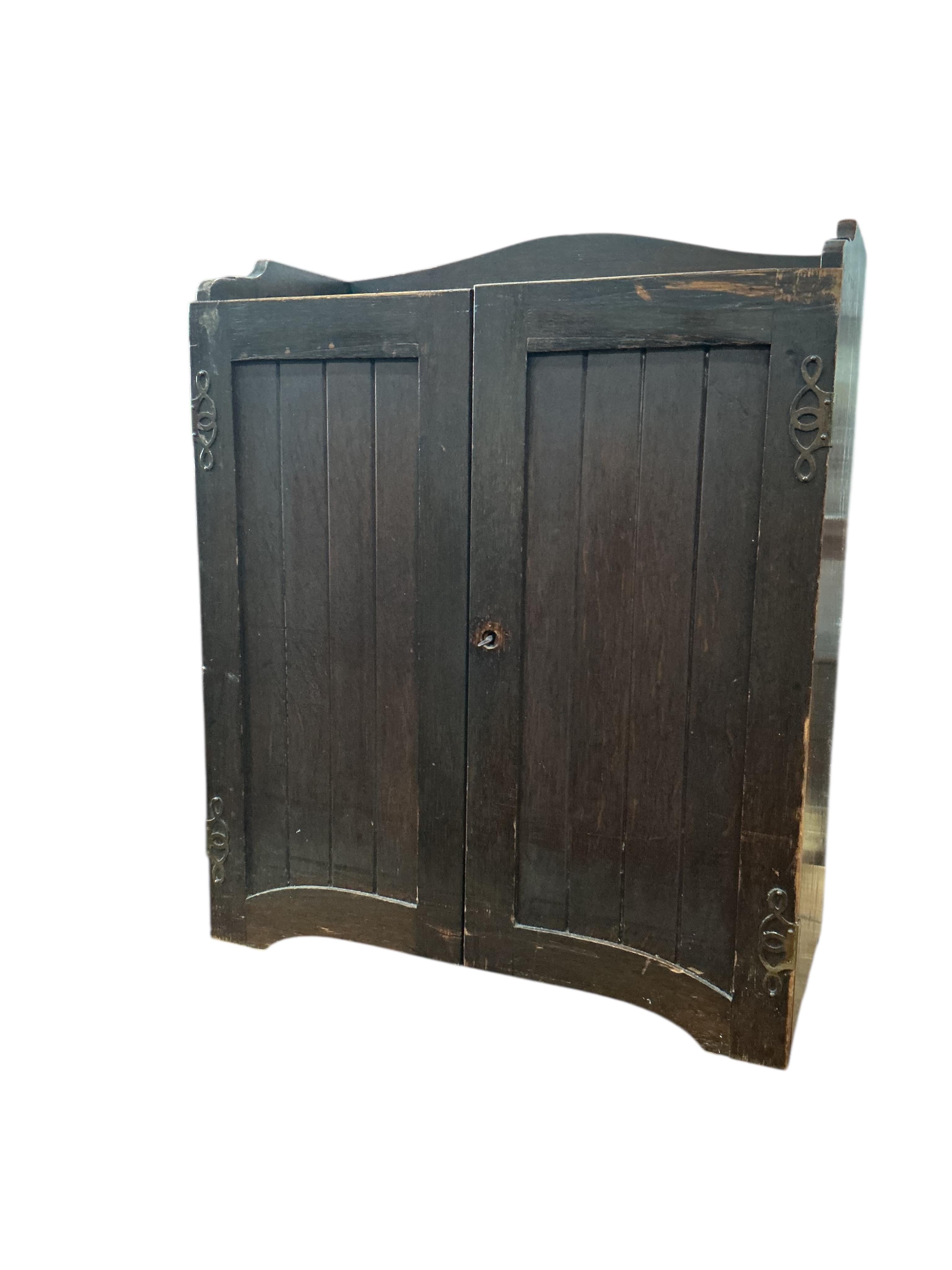 An Edwardian oak stationery cabinet, width 57cm, depth 29cm, height 72cm